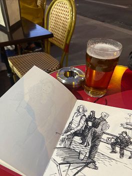 Gabriel in Paris with a Drink and a Sketch